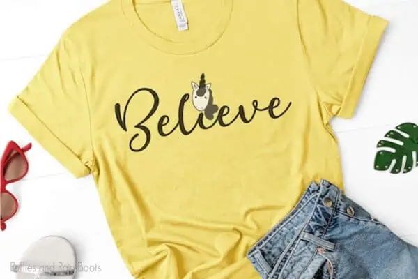 easy weed believe unicorn cut file set for cricut or silhouette on a yellow t-shirt laying on a table