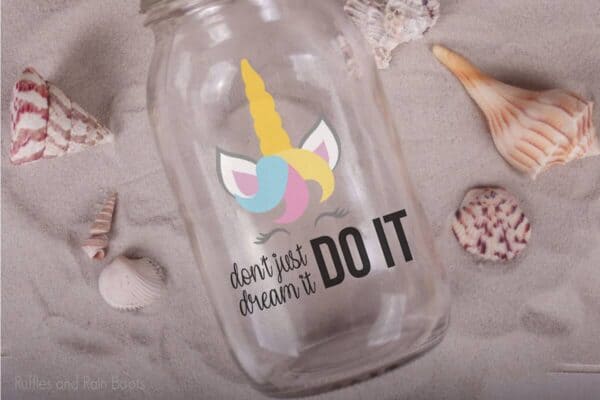 Don't Just Dream It Do It Unicorn cut file set for unicorn crafts on a mason jar laying in the sand with sea shells