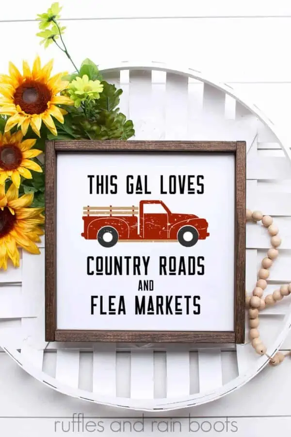 red distressed vintage truck SVG on white wood frame in cigar basket with sunflowers and farmhouse beads