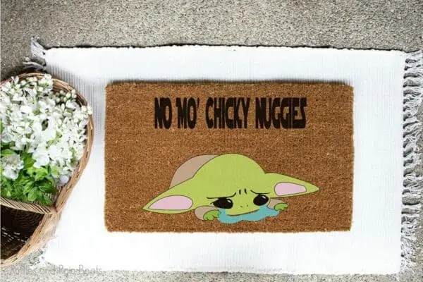 crying baby yoda cut file on a welcome mat