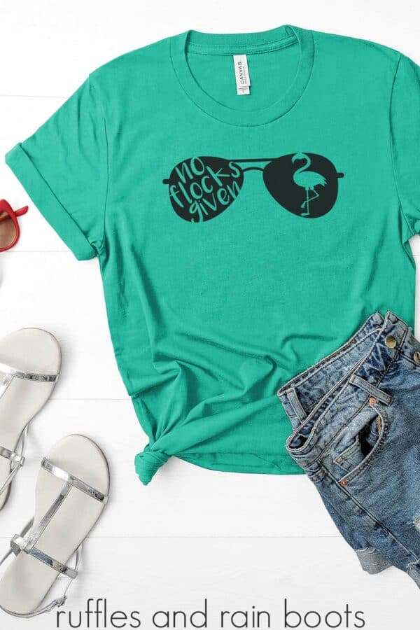 teal tshirt featuring a no flocks given flamingo svg for cricut silhouette vinyl cards