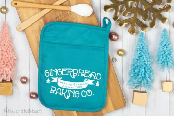 gingerbread baking co SVG cut file set for cricut or silhouette on a heat pad on a table with christmas decor