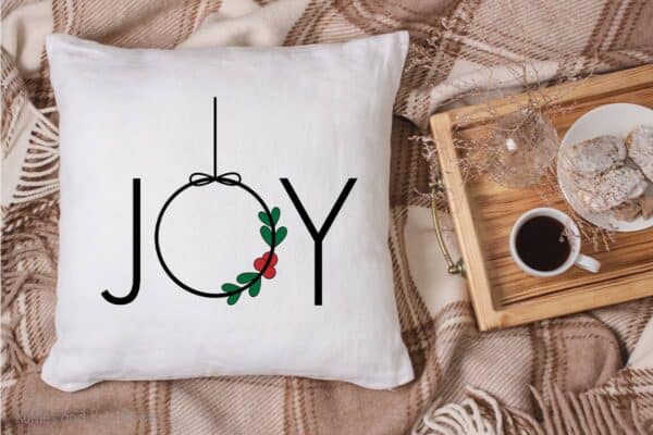 ornament joy cut file set for cricut or silhouette on a pillow