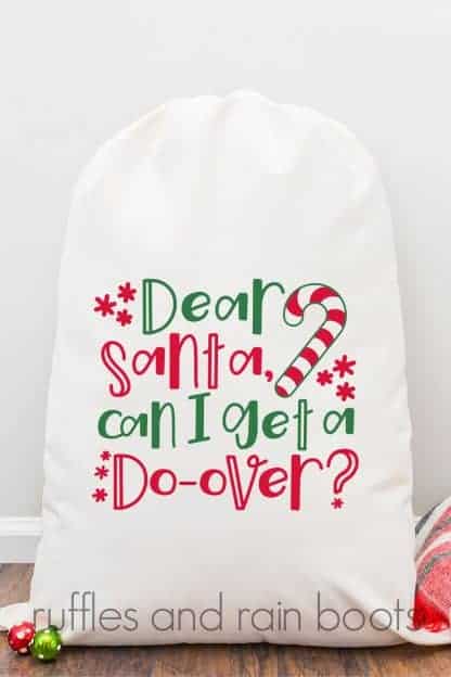 white Santa sack on hardwood floor with red white and green Dear Santa Can I get a do-over SVG for Christmas