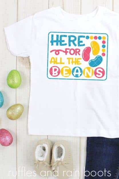 eggs and child outfit on wood background with here for the jelly beans svg in vinyl