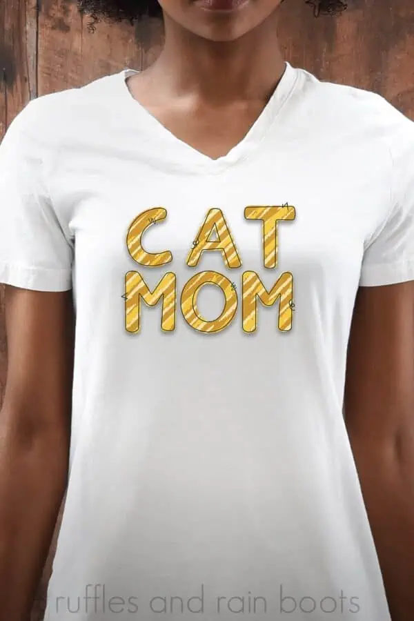 vertical image of african american woman in white shirt with free cat mom sublimation file in yellows