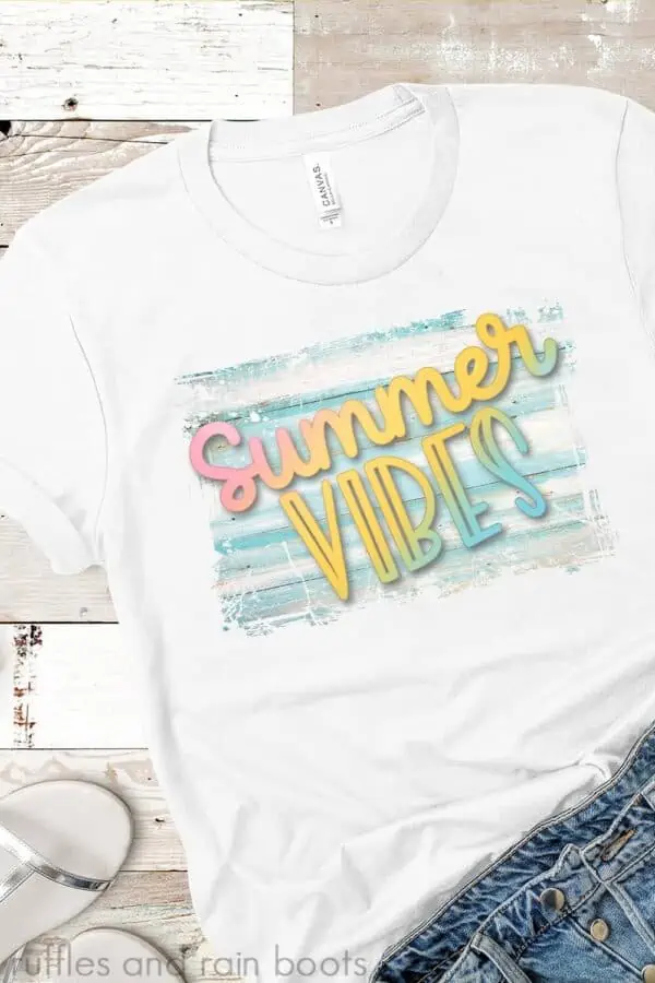 free colorful sublimation summer vibes design on white t shirt on wood background