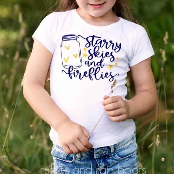 child with a shirt on which is the Summer SVG Starry Skies Fireflies