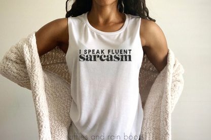 horizontal image of black woman in tank top with i speak fluent sarcasm svg in black vinyl made with Cricut Maker