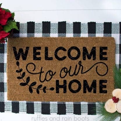Christmas doormat idea with welcome to our home svg farmhouse laurels