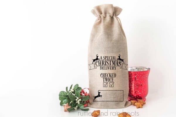 wine bag featuring a fun special christmas delivery svg for cricut or silhouette