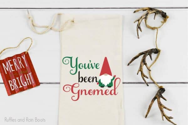 wine gift bag featuring a you've been gnomed cut file set for cricut or silhouette