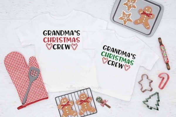 Horizontal image of holiday baked goods on white background with two t-shirts which read Grandma's Christmas Crew.