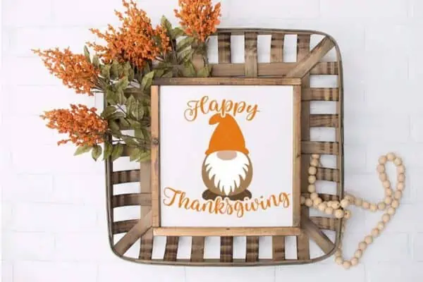 Horizontal image of a close Thanksgiving sign with gnome, farmhouse beads, and basket.