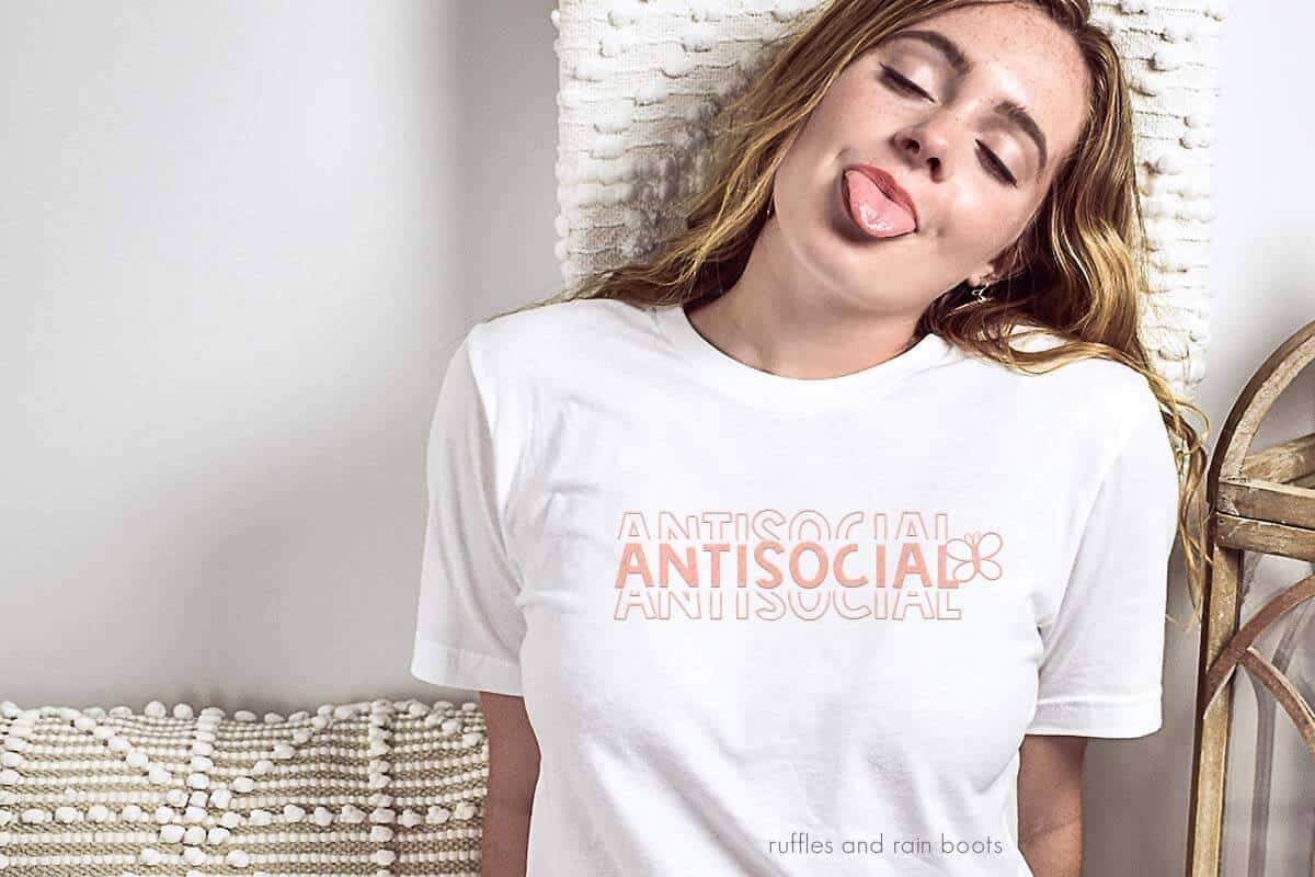 Horizontal image of woman in white t-shirt made with Antisocial Butterfly SVG free from Ruffles and Rain Boots.