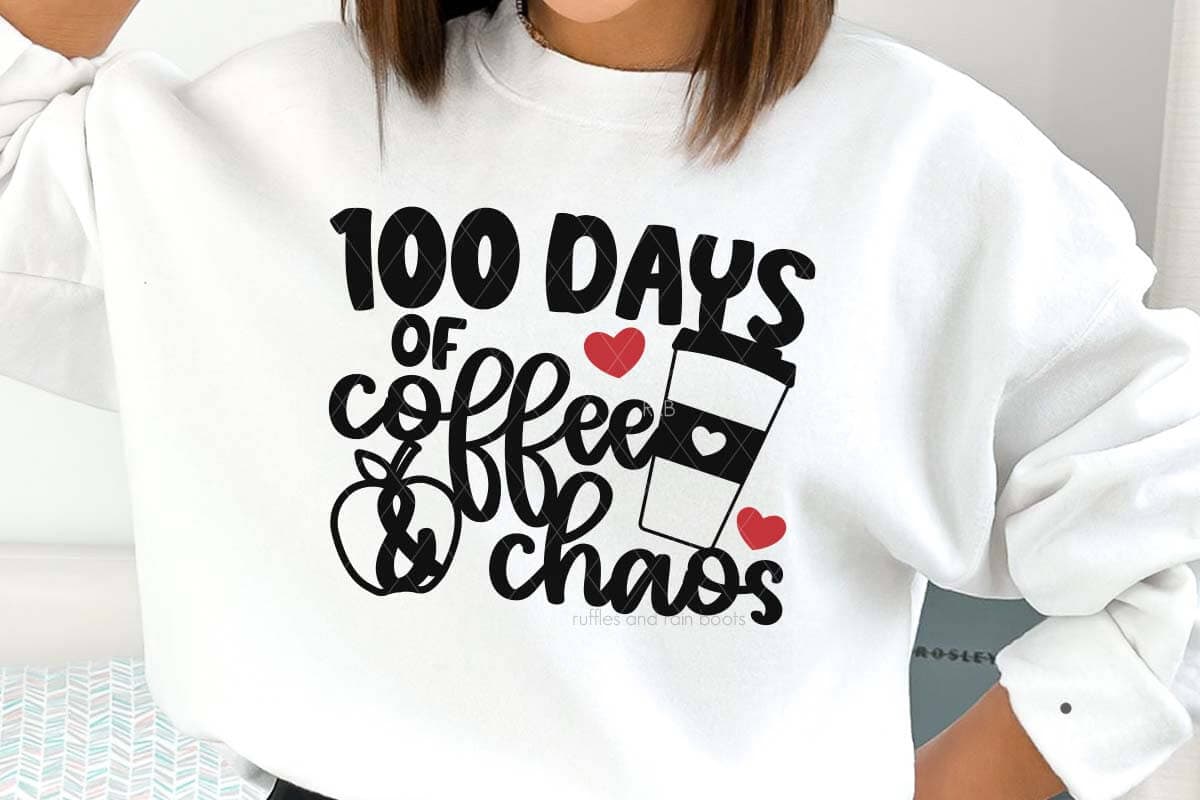 Horizontal image of woman in white sweatshirt which reads 100 days of coffee and chaos for a 100 days of school SVG.
